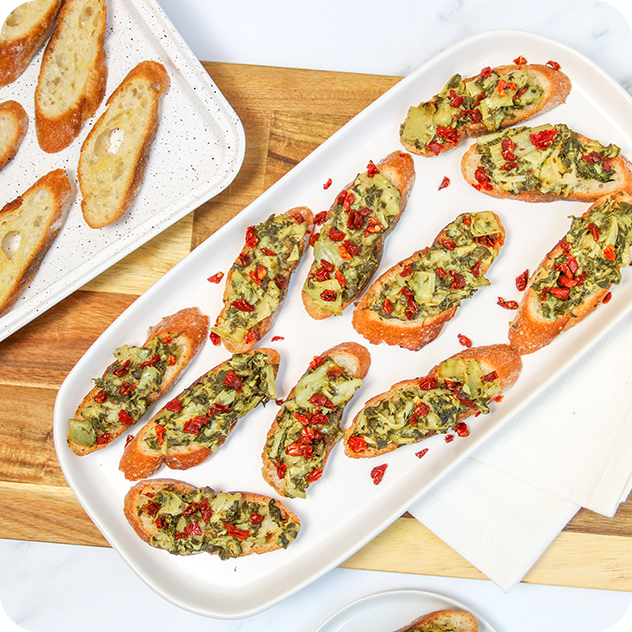 spinach artichoke crostini with sundried tomatoes